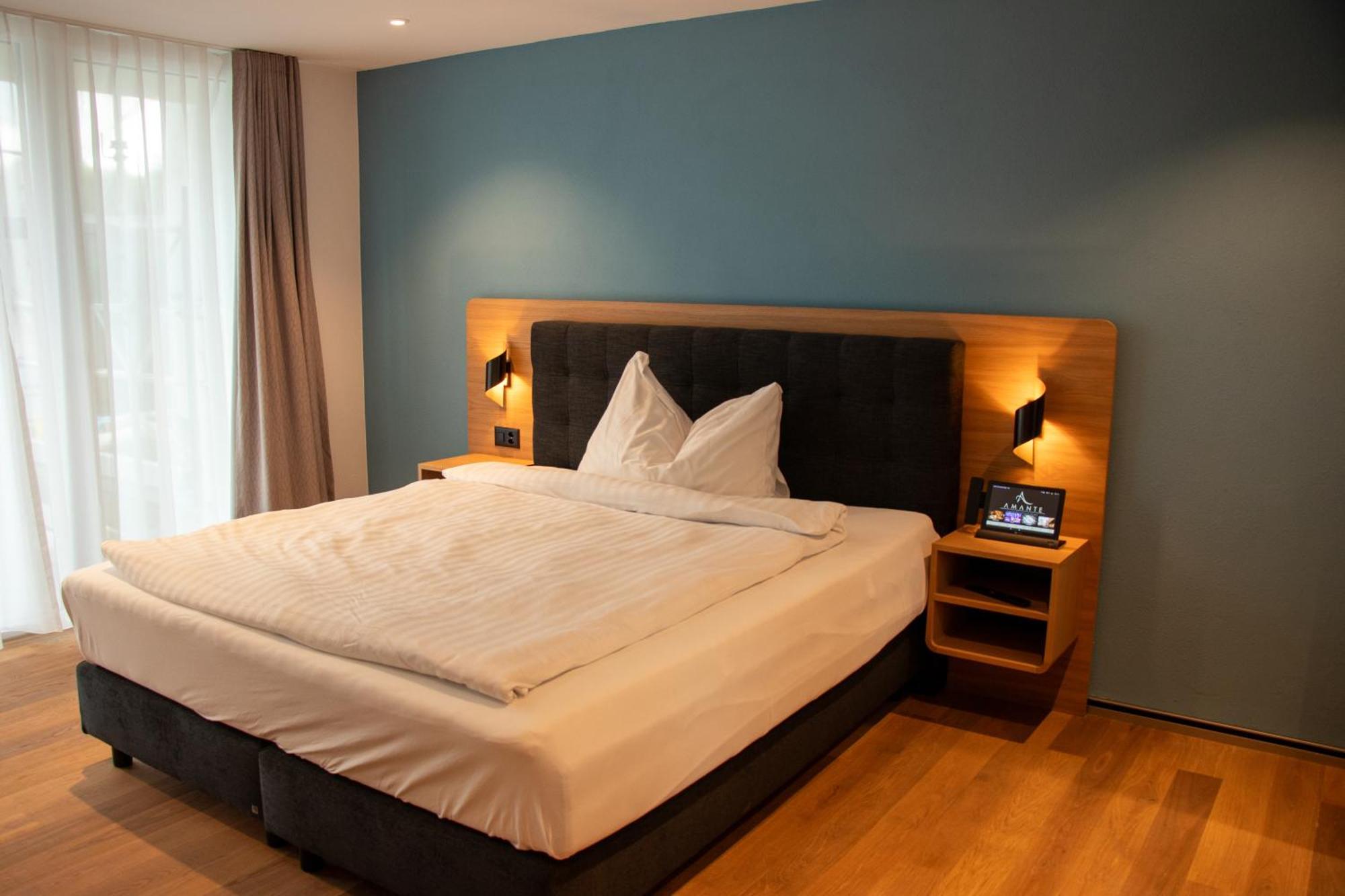 Amante Hotel Belp Bagian luar foto